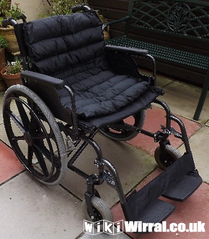 Attached picture wheel chair.JPG